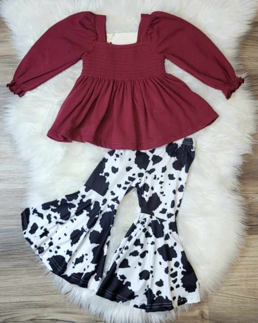 Burgundy Smocked Bubble Sleeve Top and Cow Print Bell Bottom Pants (sizes 6 and 8 available)  A Touch of Magnolia Boutique   