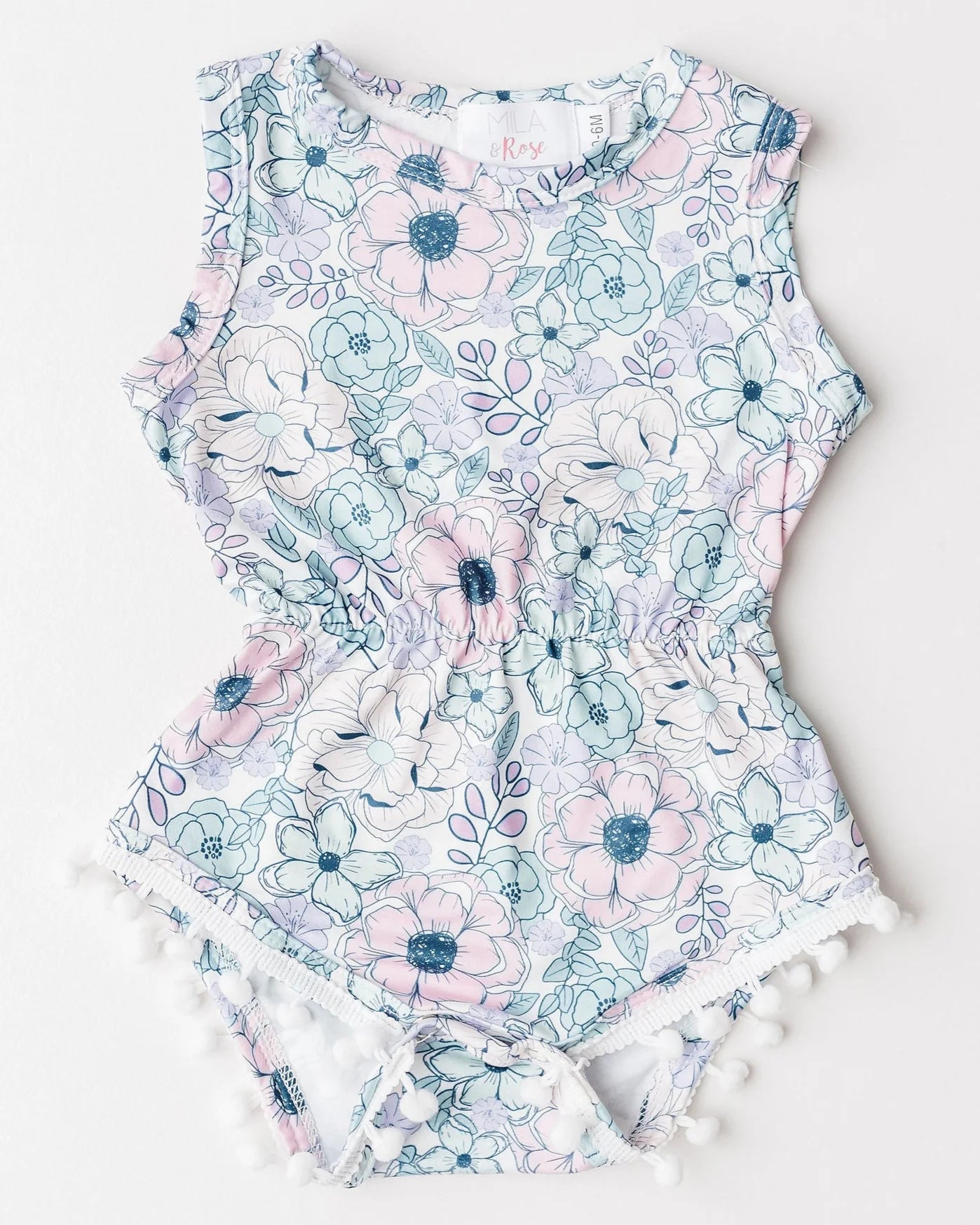 Garden Floral Pom Pom romper A Touch of Magnolia Boutique