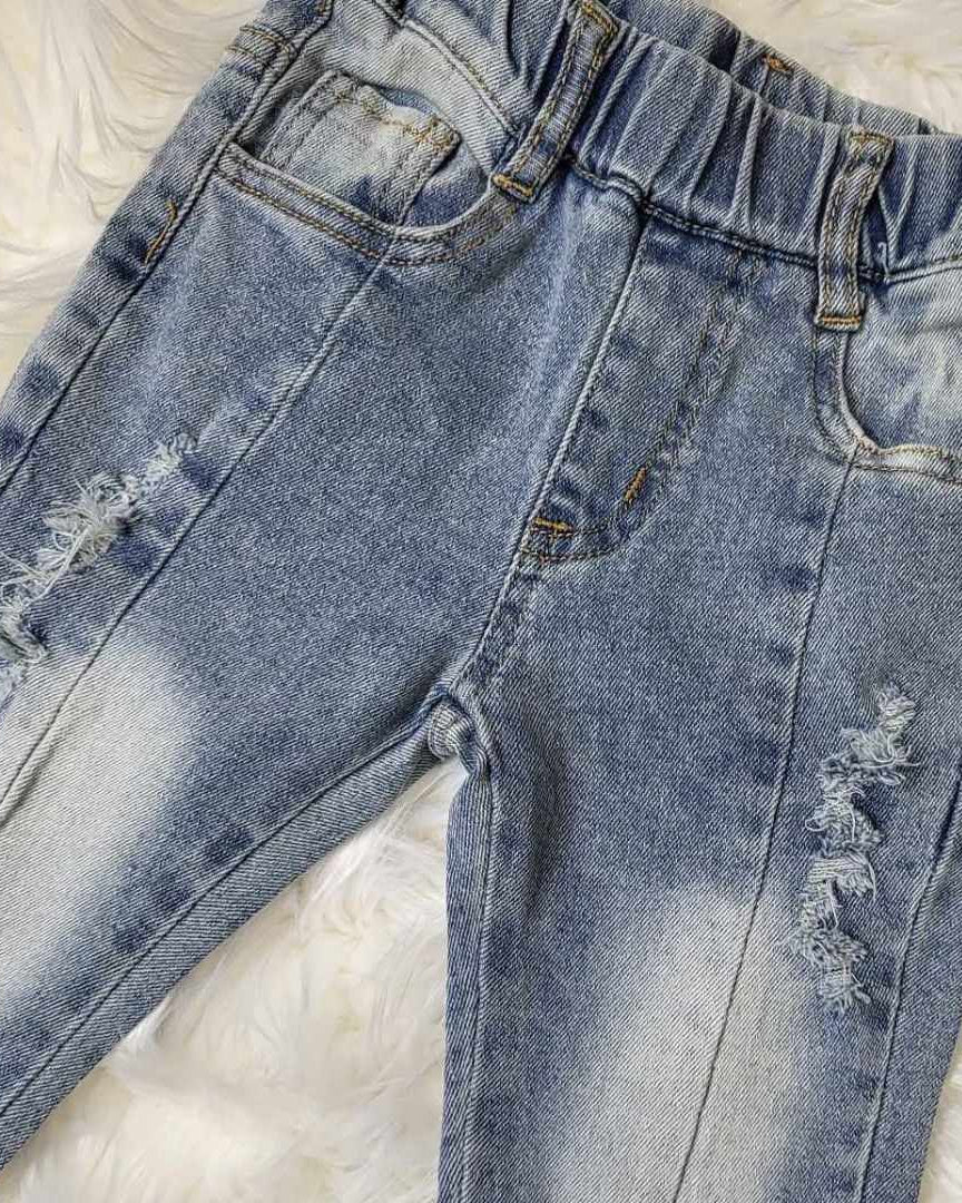 Light Wash Flare Denim Jeans with Raw Hemline A Touch of Magnolia Boutique