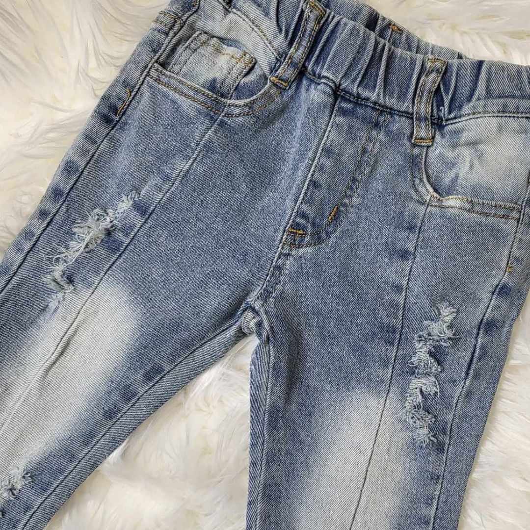 Light Wash Flare Denim Jeans with Raw Hemline A Touch of Magnolia Boutique