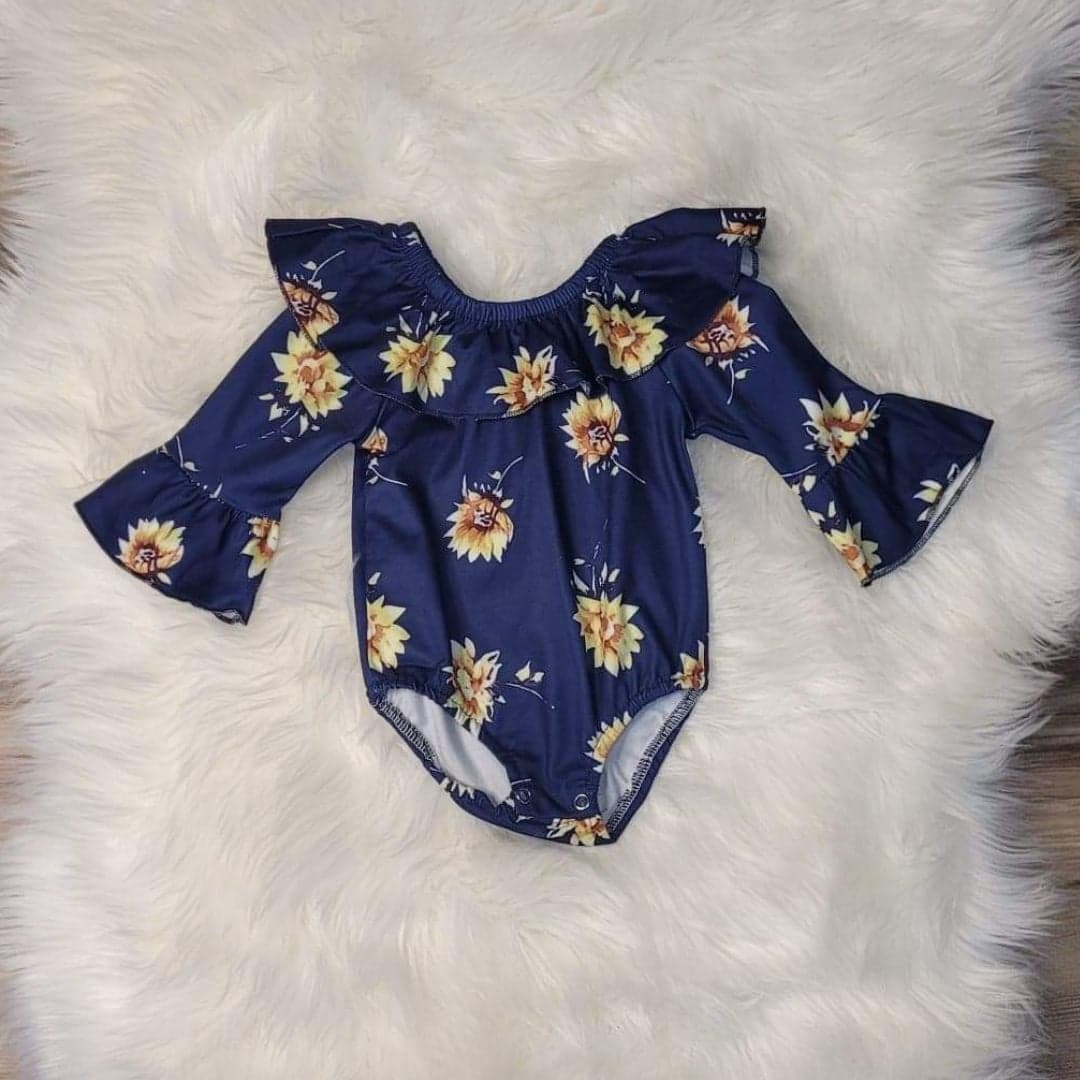 Baby Girl Blue Floral Ruffle Romper  A Touch of Magnolia Boutique   