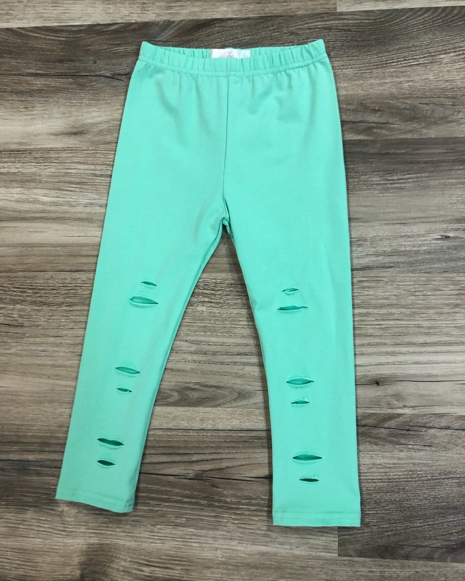 Mint ripped leggings  A Touch of Magnolia Boutique   
