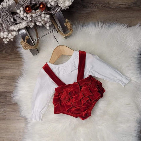 Sweet Santa baby outfit.  Ruffled red velvet suspender skirt with white ruffled top.