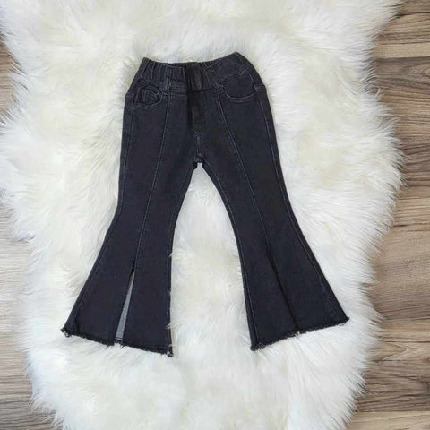 Girls boutique black denim flare jeans.  Jeans feature an elastic waistband, and a slit in the front of the flare for added charm.