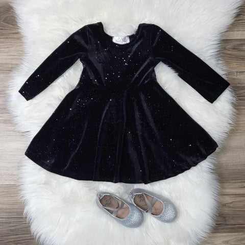 Girls boutique dress featuring long sleeve black velvet, in a twirl style adorned with silver sparkle.  The children's boutique dress pairs perfectly with our featured zip back ballet shoes in sliver glitter.