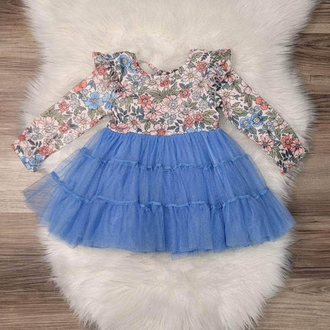 Girls boutique tiered tulle dress.  The top portion has a floral print, and the dress ties on the nape of the neck.  The cornflower blue tulle completes the look.