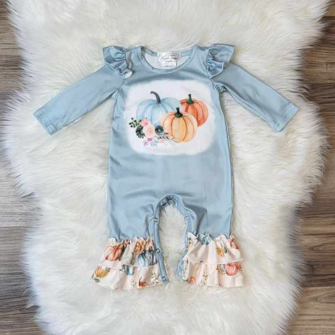 Baby girl romper.  Blue snap closure romper with pumpkin sublimation print, ruffled shoulders, and pumpkin print ruffles at ankles.