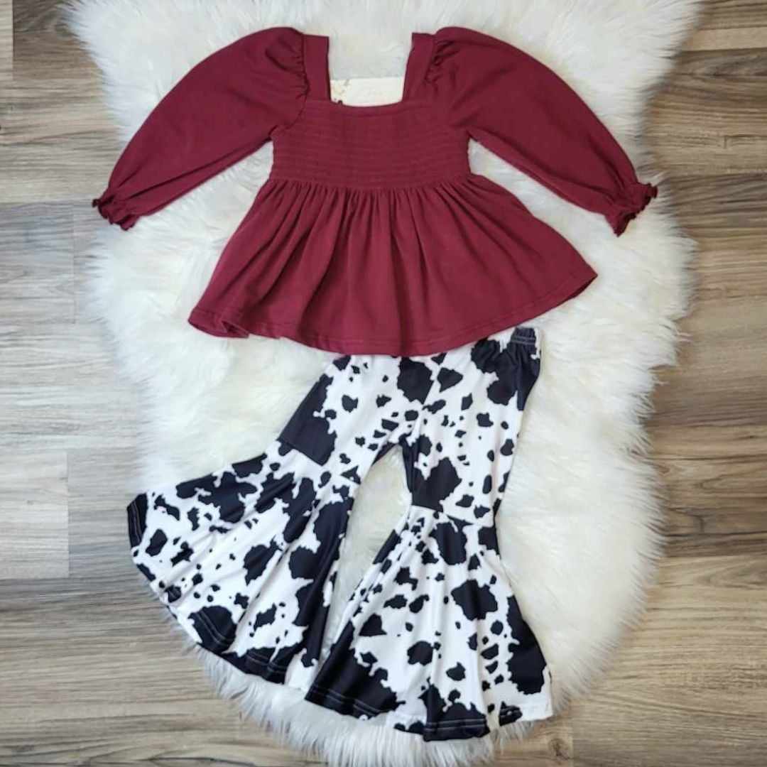 Burgundy Smocked Bubble Sleeve Top and Cow Print Bell Bottom Pants (sizes 6 and 8 available)  A Touch of Magnolia Boutique   