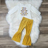 Girls boutique clothing two piece set.  Top says: "turkey, gravy, beans and rolls, let me see that casserole", and it is paired with mustard velvet flare pants.