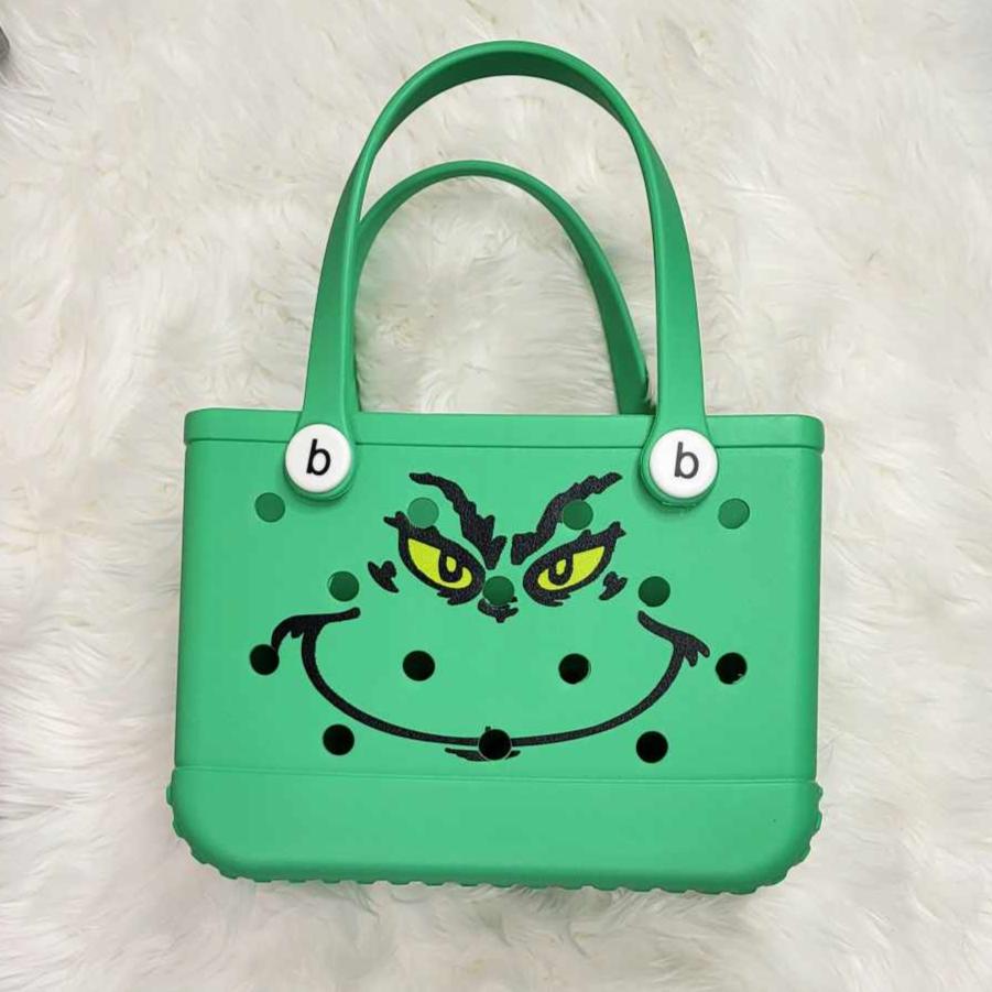 Small EVA bags (multiple solid color and printed options)  A Touch of Magnolia Boutique Green Guy Face  