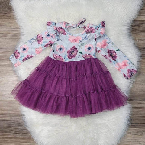 Girls boutique dress.  Gorgeous floral print long sleeve dress with angel sleeve, tie back, and a spliced deep orchid skirt complete this dress.