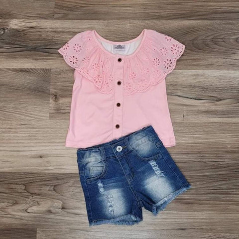 Girls boutique pink button front top with lace overlay ruffle detail, paired with lightly distressed denim jean shorts.