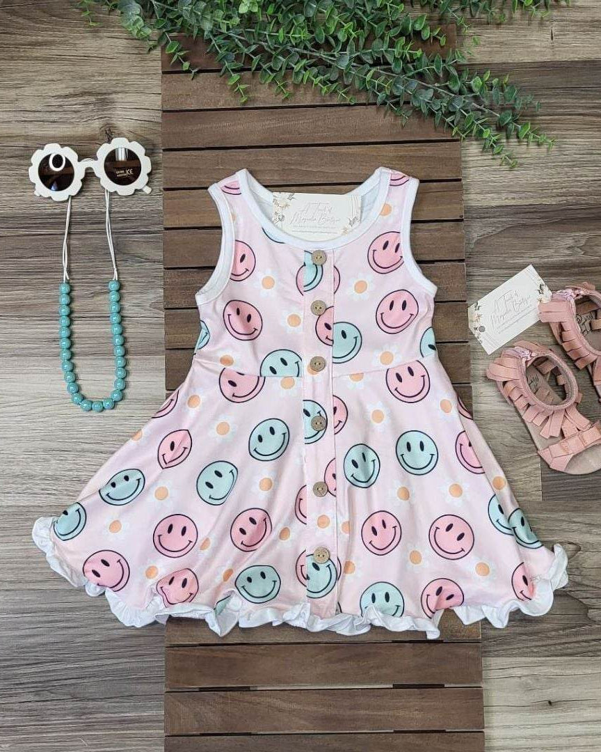Smiley Sleeveless Faux Button Twirl Dress  A Touch of Magnolia Boutique   