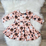Girls boutique Halloween themed dress.  Print has ghosts, witch ghosts, bats, spiders, and more.