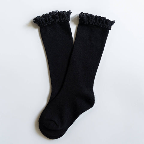Black knit knee high socks with a lace top for babies, toddlers, and young girls.