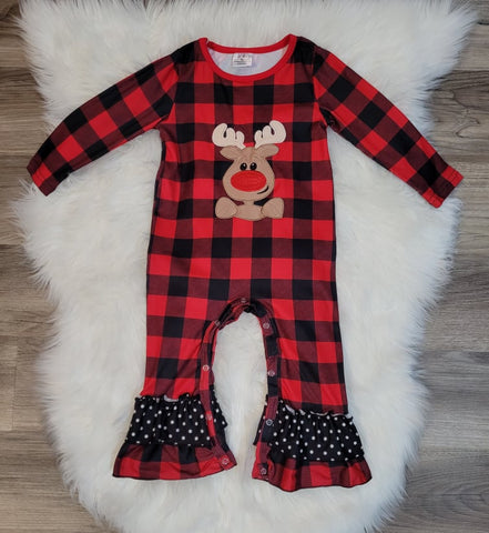 Baby girl buffalo plaid print romper with red nosed deer applique, and black and white polka dot ruffle at ankle.  Snap closure.