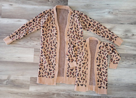 Fuzzy, soft children's boutique leopard print cardigan.  Available in kids and adult, mom and me matching.