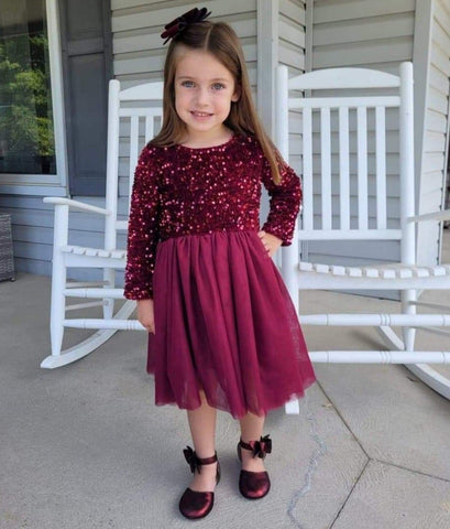 Girls boutique dress.  Burgundy velvet adorned with sequins, with a burgundy tulle skirt complete this special occasion dress.