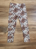 Girls leopard print ripped leggings.