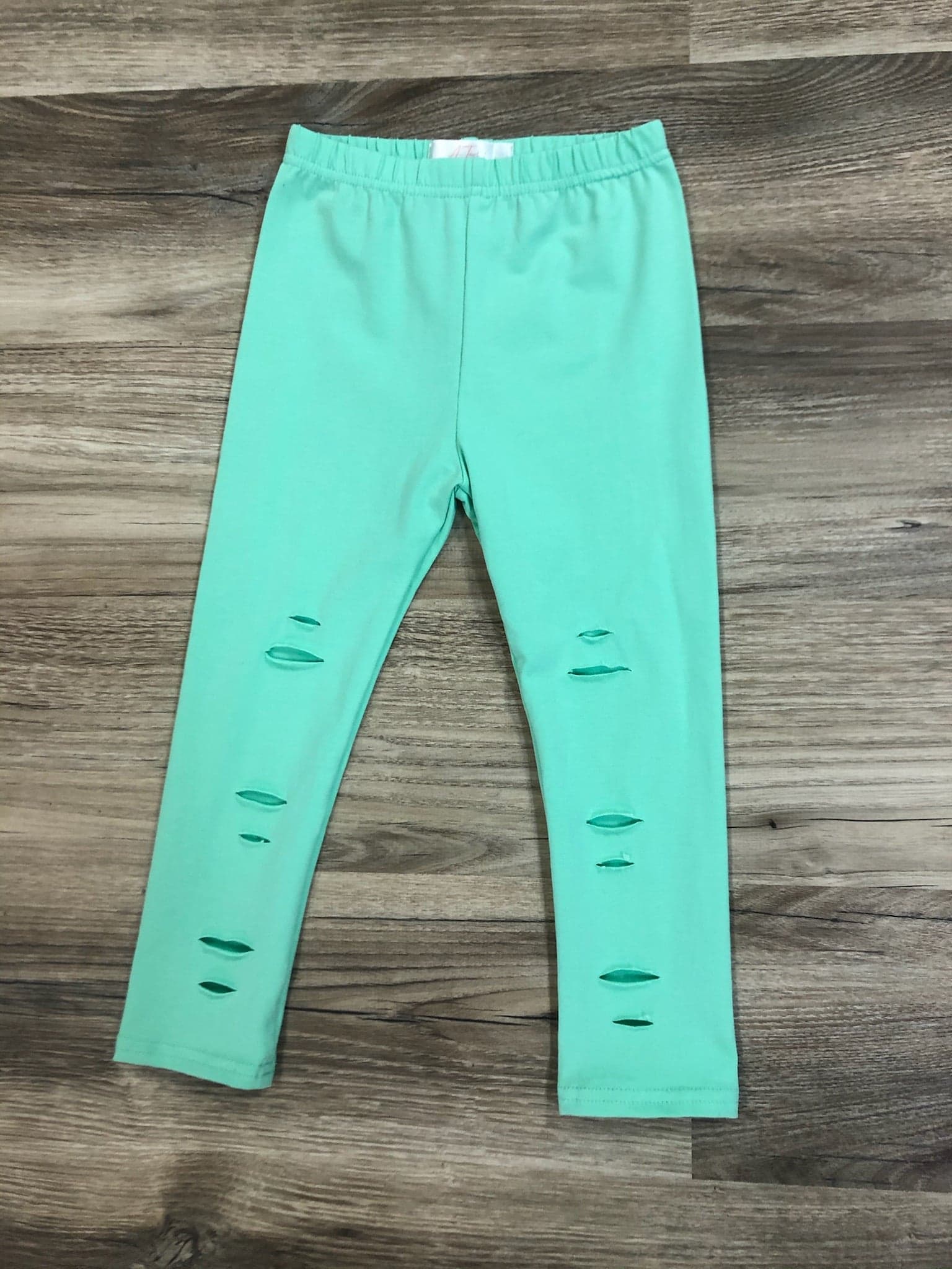 Mint ripped leggings  A Touch of Magnolia Boutique   