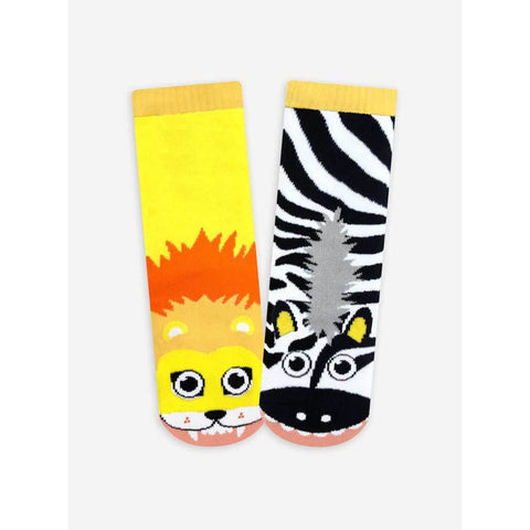 Fun mismatched tube socks featuring a lion on one foot and a zebra on the other.