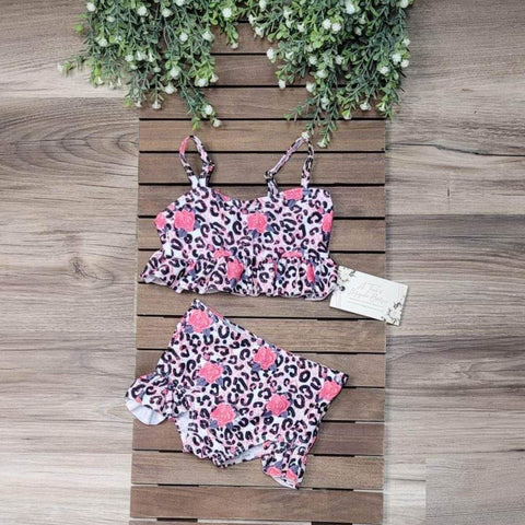 Girls boutique 2 piece swimsuit in a leopard print with pink floral print.