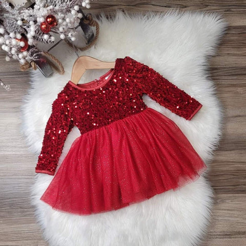 Plush velvet embellished with red sequins, sparkling tulle on skirt for the perfect holiday dress.