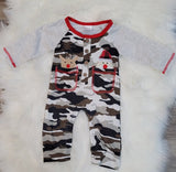 Baby boy romper in camo print with grey sleeves.  Santa and Rudolph are peaking out of faux pockets.  Adorable baby boutique romper for the holiday and Christmas season.