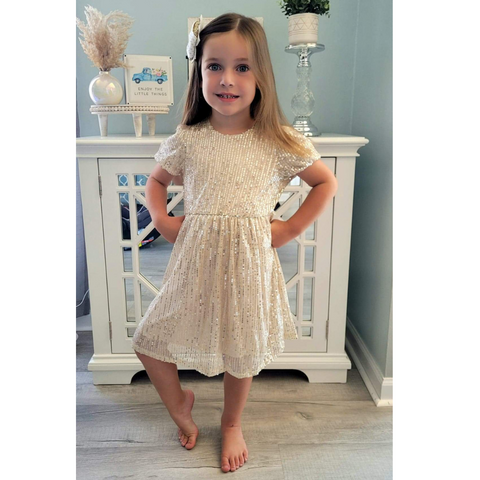Girls boutique short sleeve beige dress with all over sequin pattern.  