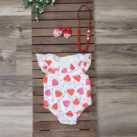 Baby girl boutique white ruffle romper with strawberry pattern.  Snap closure for easy changing.